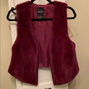 Burgundy small faux fur vest.